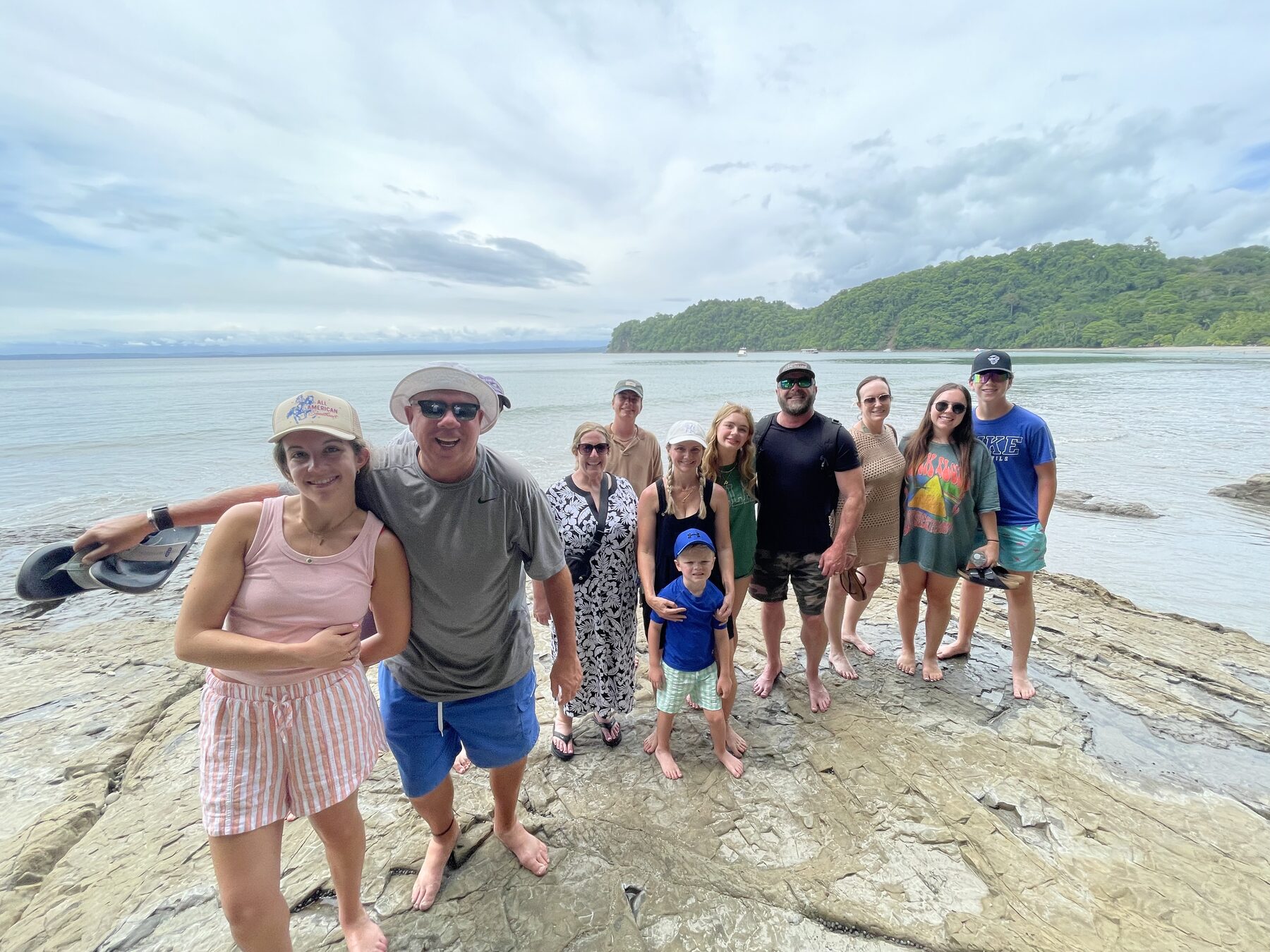 A big group with their guide on the rocks at Playa Mantas — Jaco Costa Rica best snorkeling