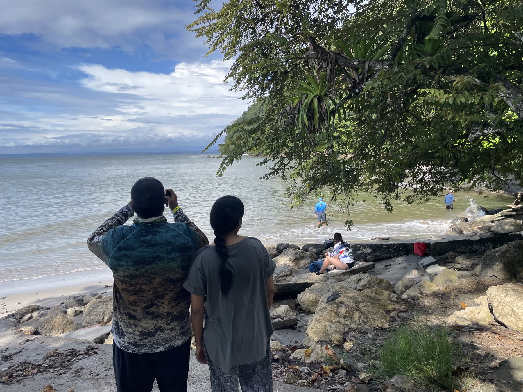 A couple looking out at the sea at Playa Mantas — top snorkel tour Jaco beach