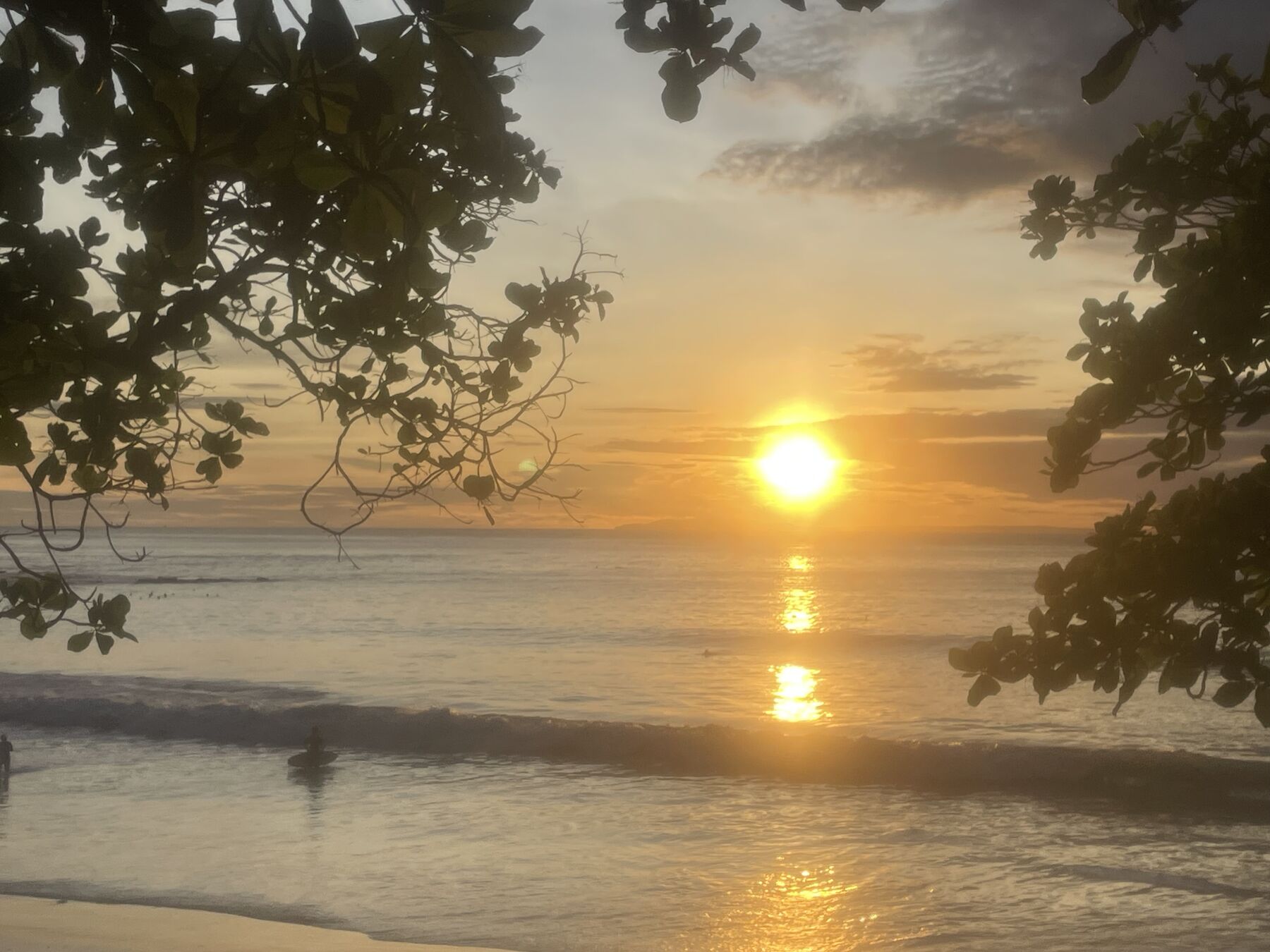 Jaco Costa Rica snorkeling in green season — the sun setting over the Pacific at Playa Mantas