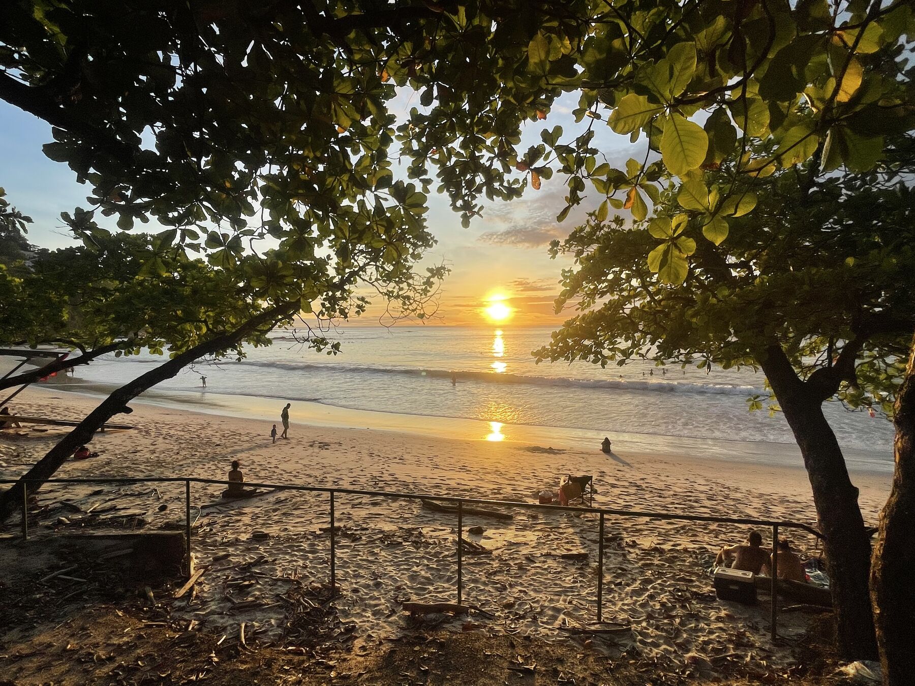 Snorkeling Jaco green season — wide sunset over Playa Mantas beach, Jaco Costa Rica