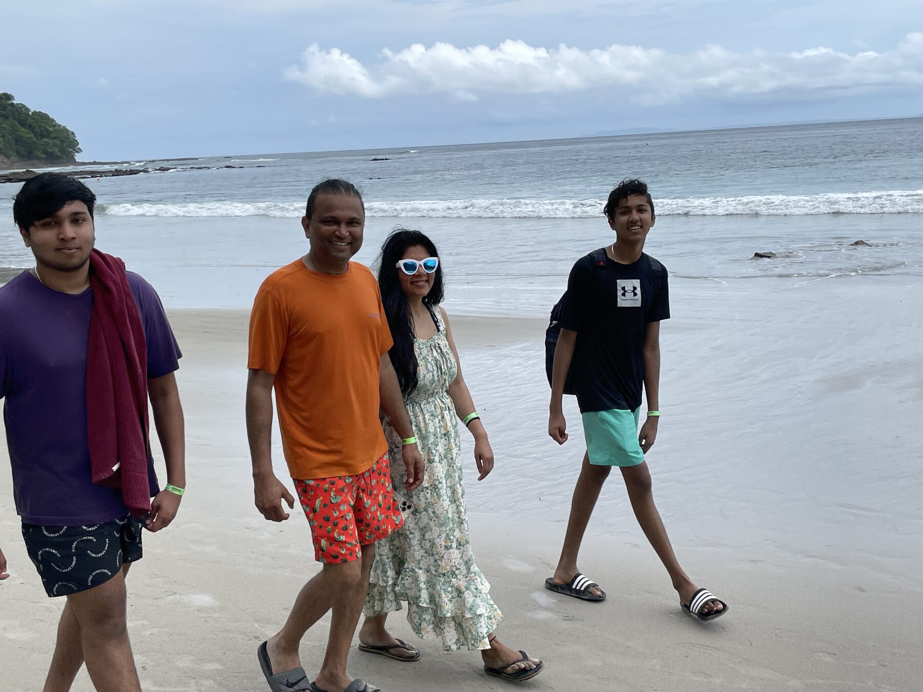 A group of five guests on the beach at Playa Mantas — Jaco Costa Rica best snorkeling