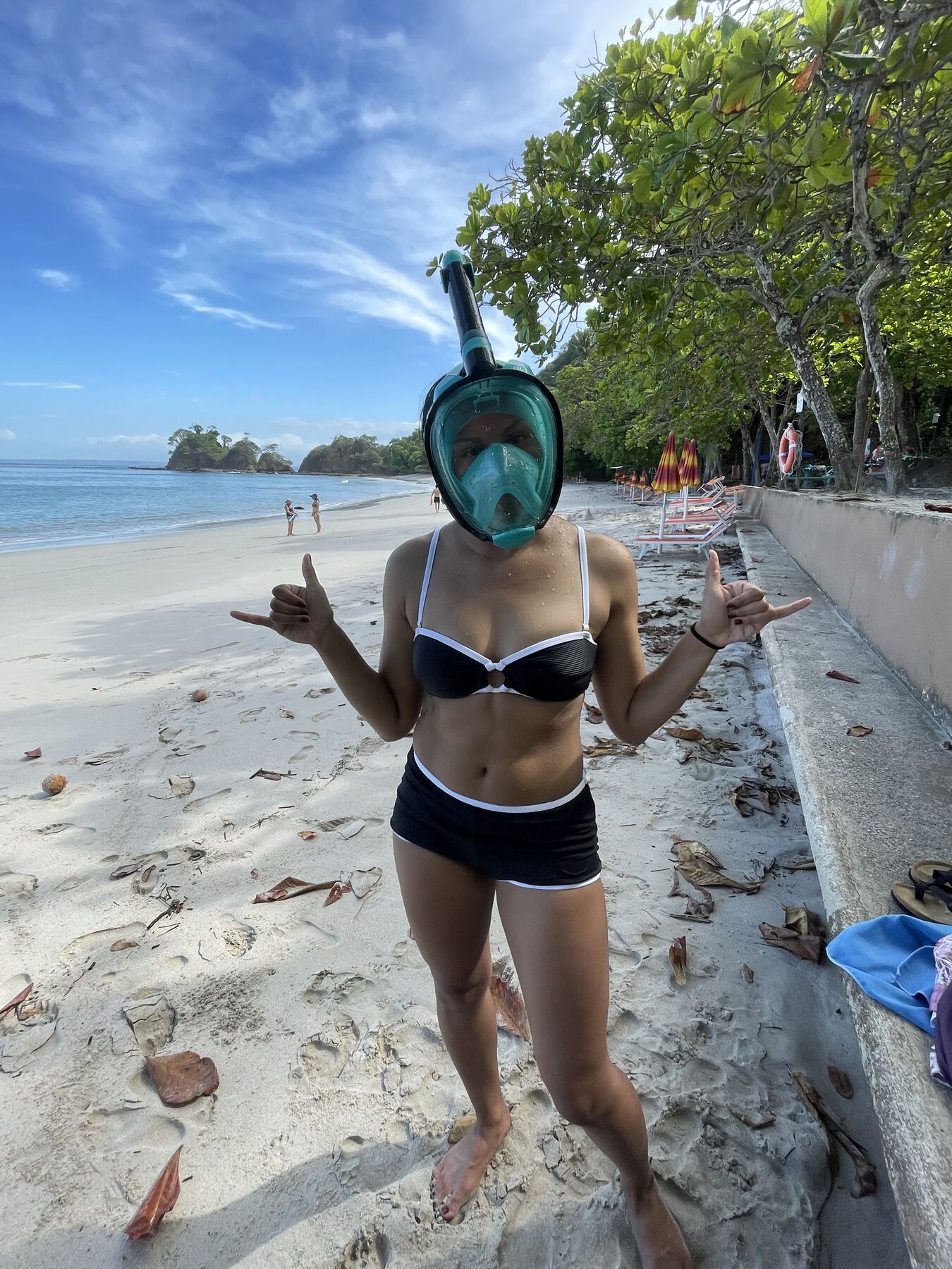 Guest wearing a snorkel mask ready to swim near Jacó