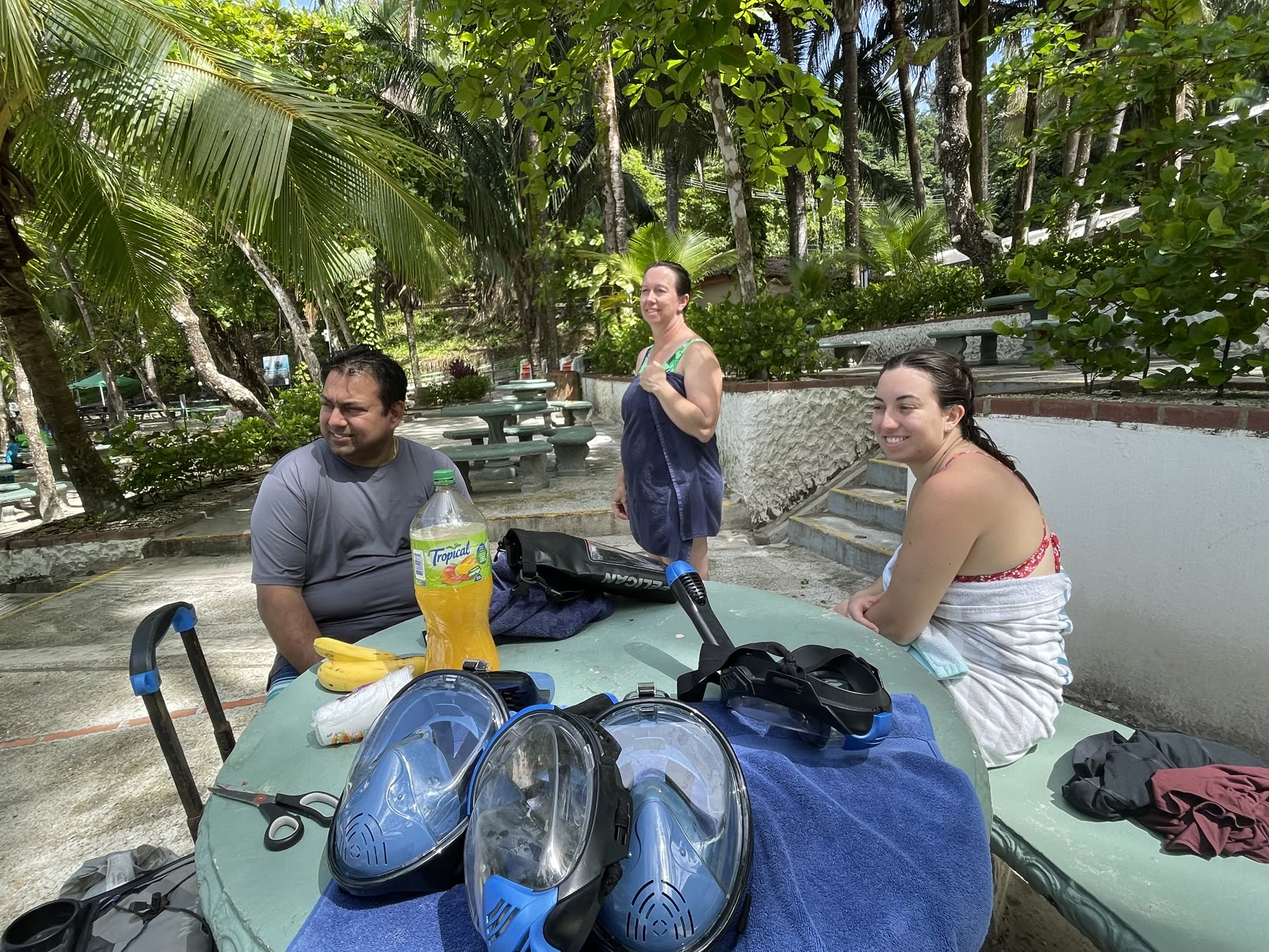 Full-face snorkel masks and gear laid out at the Playa Mantas base camp — top snorkel tour Jaco beach