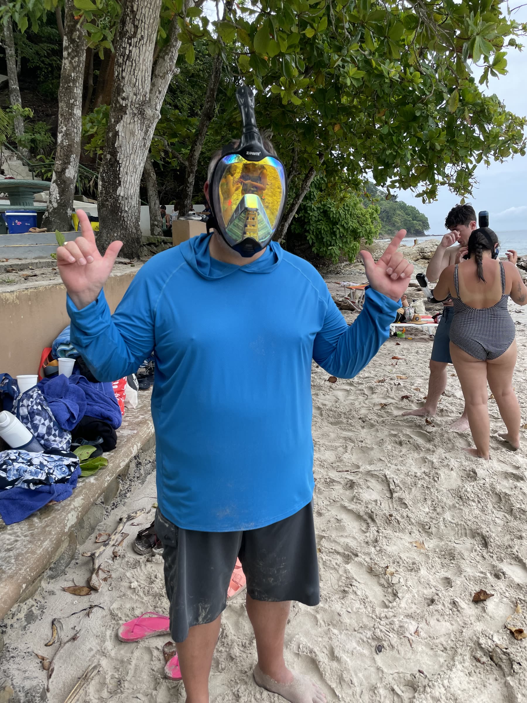 A guest holding his snorkel mask at Playa Mantas — Jaco Costa Rica best snorkeling