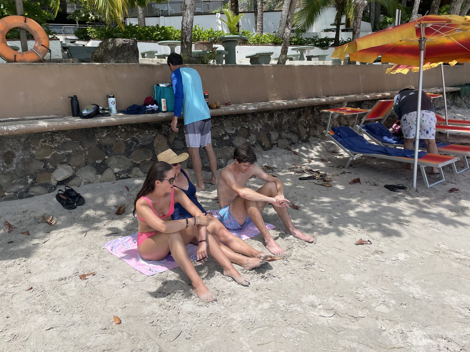 Guests relaxing in the shade between swims on a Jaco beach snorkel tour. — Jacó beach snorkel tours with Snorkel Jaco