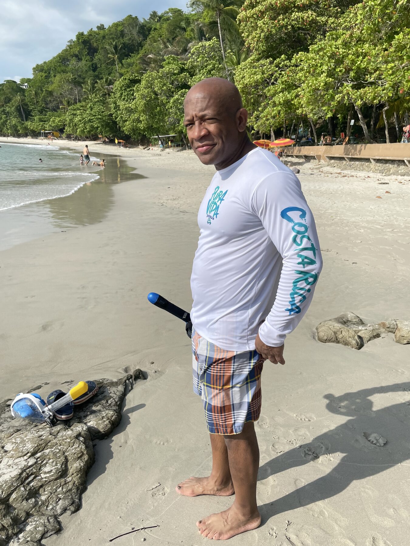 A Snorkel Jaco guide on the beach ready to lead a Jacó beach snorkel tour — top snorkel tour Jaco beach