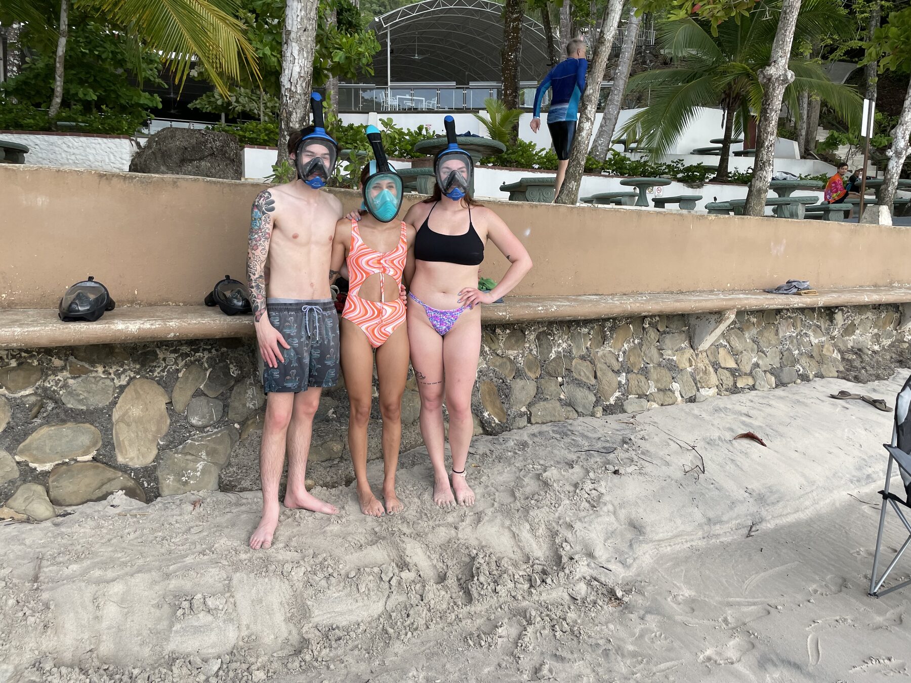 Three guests geared up in their masks at Playa Mantas on a best snorkel tour Jaco beach day