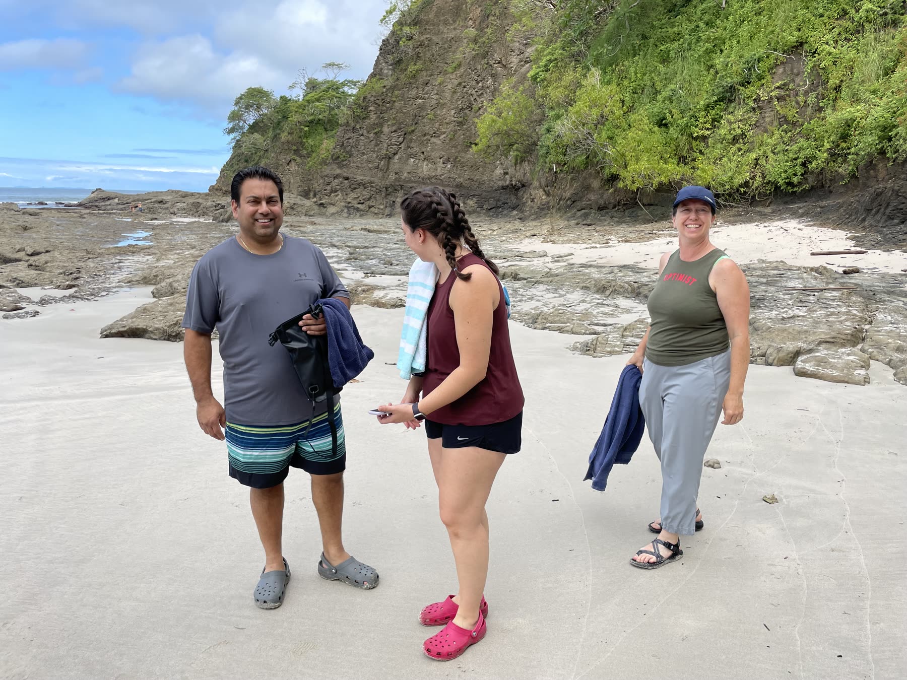 Guests walking the beach at Playa Mantas — Jaco Costa Rica best snorkeling