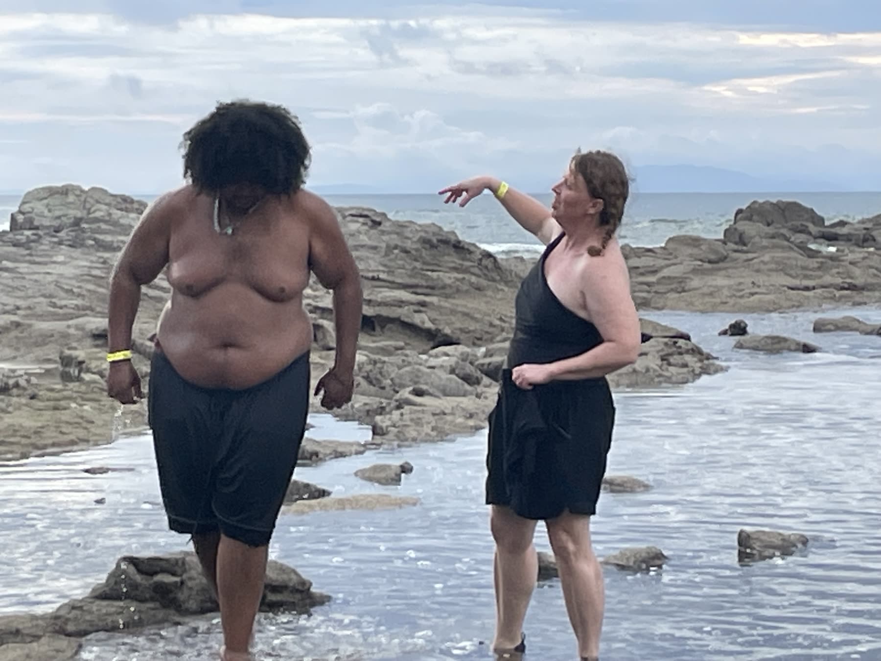 Guests at the tide pools on the point at Playa Mantas — top snorkel tour Jaco beach