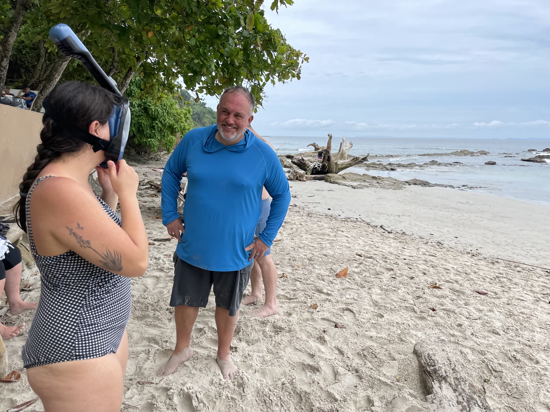 A guest with her snorkel mask and guide at Playa Mantas on a best snorkel tour Jaco beach day